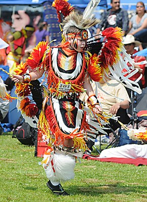Colourful outfits adorned hundreds of First Nations peoples from around the Pacific Northwest as they gathered at the Capilano Reserve Park grounds for the 25th Annual Squamish Nation Powwow. Dancing and drumming, craft sales and salmon BBQ'S were all part of the event open to everyone.