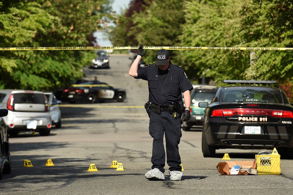 On Tuesday morning, police continue to investigate a shooting in the 500 block of West 27th Avenue near Cambie. Photo Dan Toulgoet