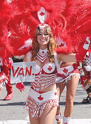 A Samba dancer sports a Canadian colour scheme.