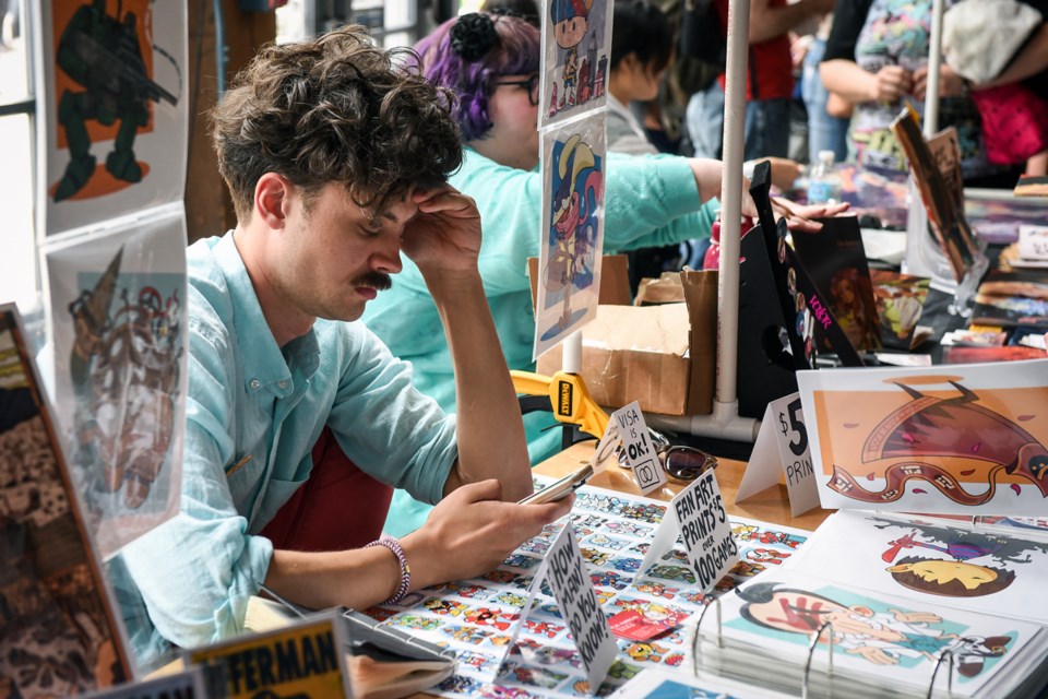 JJ McCullough was just one of the many local cartoonists participating in the fifth annual Vancouver Comic Arts Festival at the Roundhouse Community Centre this past weekend. Photograph by: Rebecca Blissett