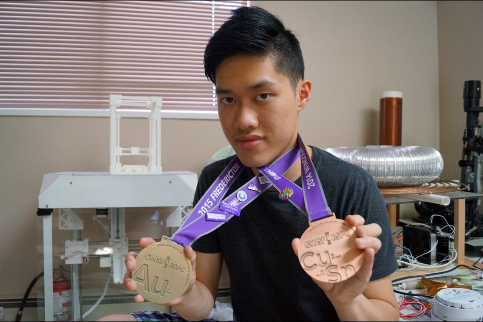 Ray Liu with his 2014 and 2015 national science fair medals.