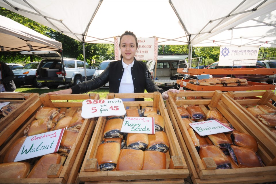Almira Akhmedzhanova selling Ukrainian baked goods for Soledko Ukrainian Bakery.
