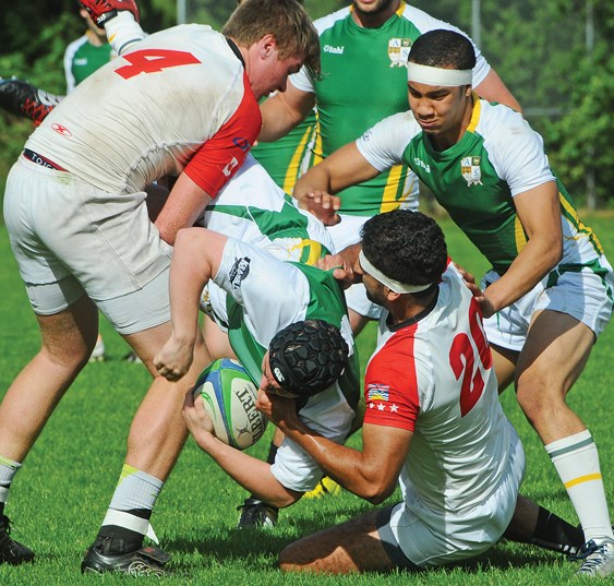 Members of the Carson Graham and Argyle senior boys teams battle during a North Shore league game. Both teams medalled at last week’s B.C. championships. photo by Cindy Goodman, North Shore News
