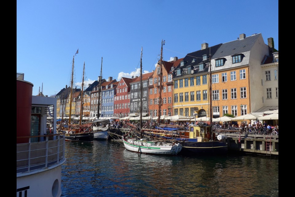 Thousands enjoy restaurants and bars lining the Copenhagen waterfront.