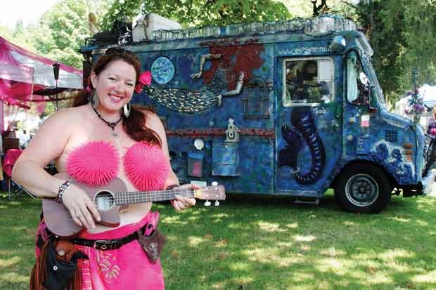 Michelle Kaiser, fortune teller, musician and vocalist with her unique bus.