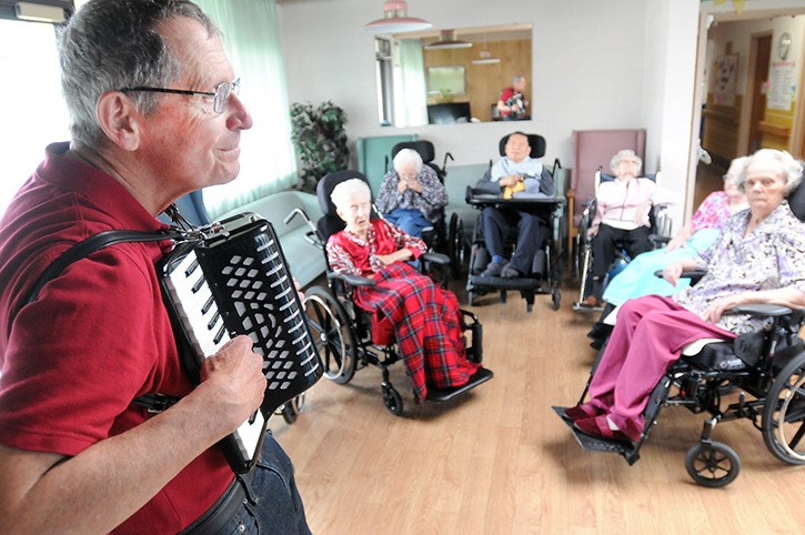 Seniors at the Fraserview seniors care facility in Richmond are privy to some live accordian music.