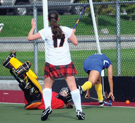 Handsworth goalie goes down as ball crosses the goal line.