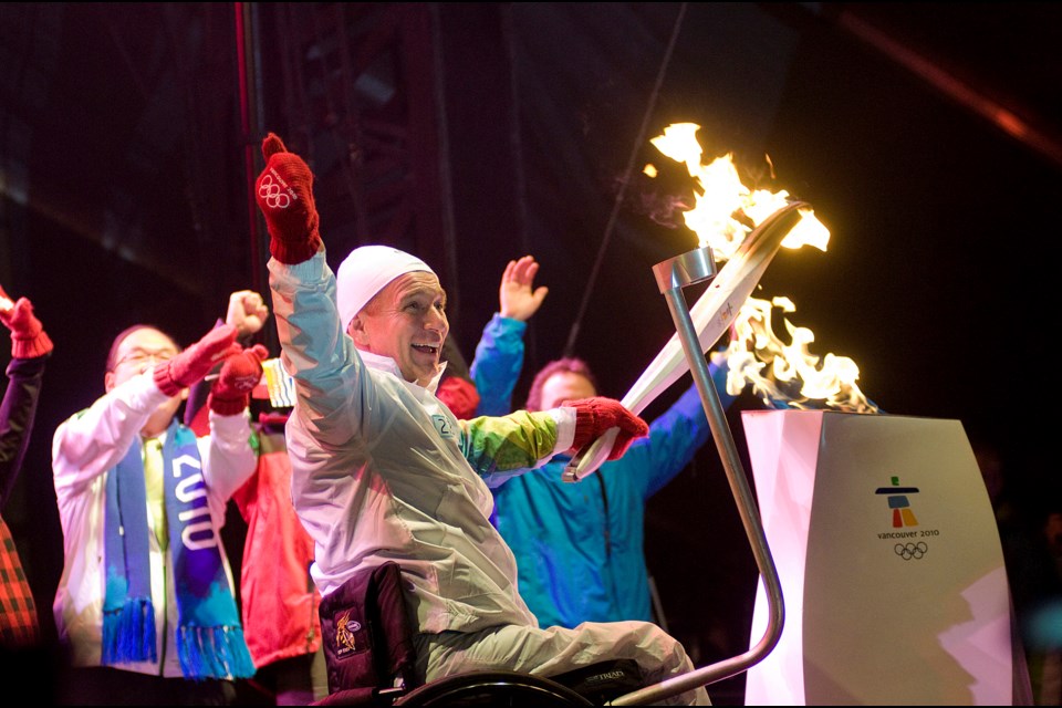 Richmond paralympic athlete (retired) Rick Hansen shared in the Olympic flame run in Richmond at the O Zone.