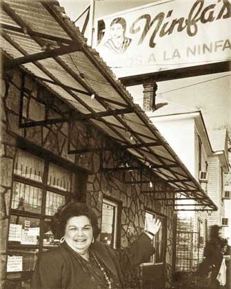 Restaurateur Ninfa Laurenzo (1924-2001) stands in front of her restaurant in Houston.