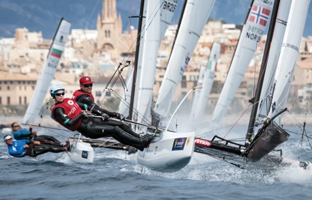 West Vancouver’s Nikola Girke and sailing partner Luke Ramsay try to tame the Nacra 17 catamaran they’ll be racing in the Summer Olympic Games in Rio in August. This will be Girke’s third different event in an Olympic career that began in 2004. photo supplied saltycolours.com