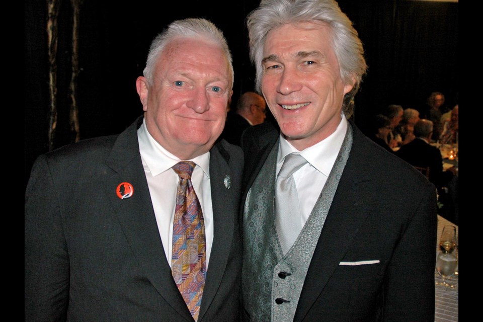 Vancouver Opera music director Jonathan Darlington, right, hit all the right notes when he orchestrated a special concert to pay tribute to outgoing general director James Wright. .