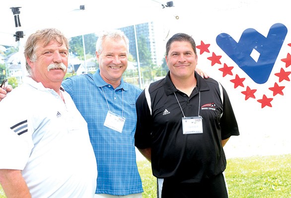 Event co-ordinator Clark Deboer, club president Bill Sparling and head coach Jammer Afshar greet guests.