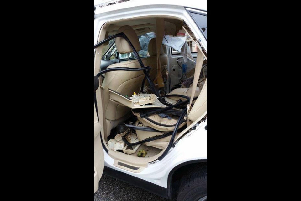 The rear passenger door of a car was ripped back, its frame bent, side airbags trashed and seats shredded in West Vancouver's British Properties neighbourhood on Sunday. It is believed that a bear did the damage.