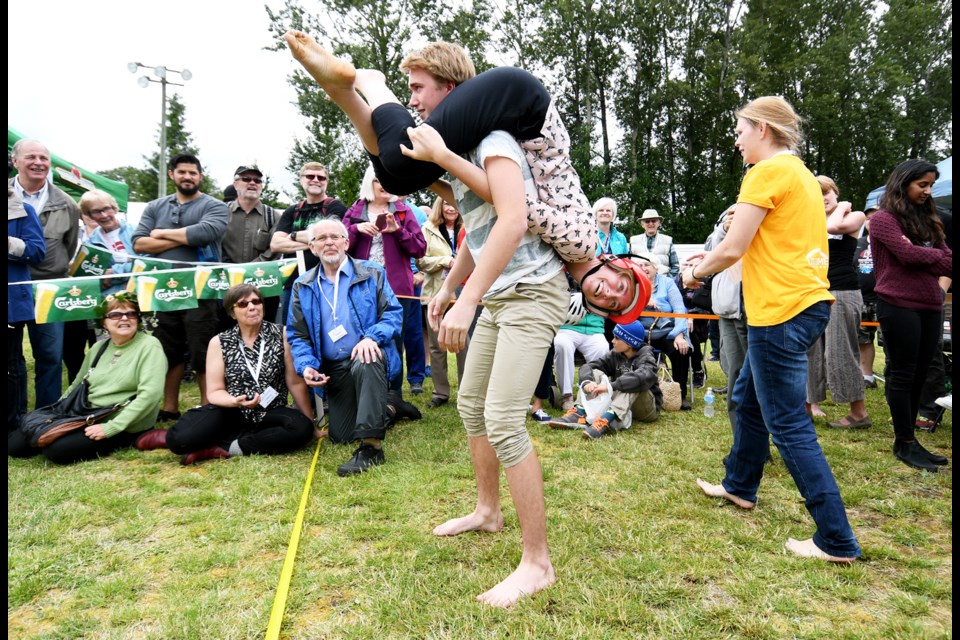 Competitors are ready to tackle the Wife Carrying Contest course.