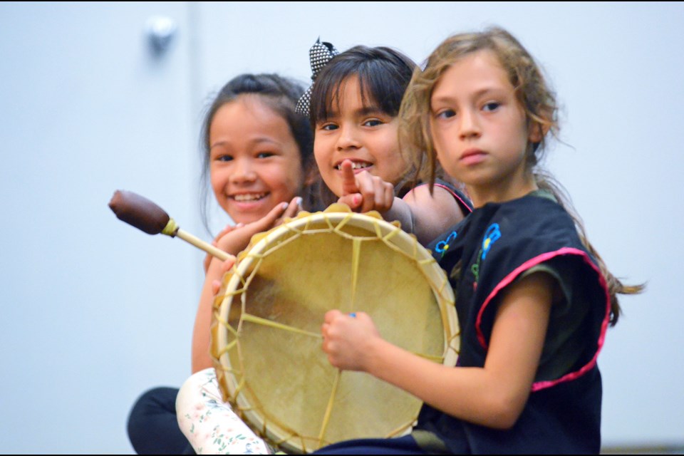 Stride Avenue Community School drummers Raveen Snow, Alesha Marsden and Maya Jir wait to perform on the Edmonds Community School gym stage during Burnaby’s first National Aboriginal Day celebrations Tuesday.