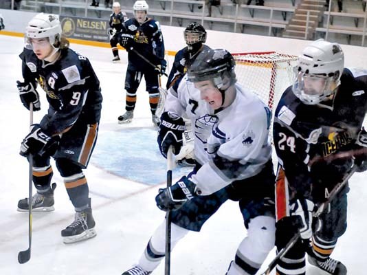 The North Van Wolf Pack (white) in action against the Delta Ice Hawks at Harry Jerome Arena in a Pacific Junior Hockey League best of seven playoff series.