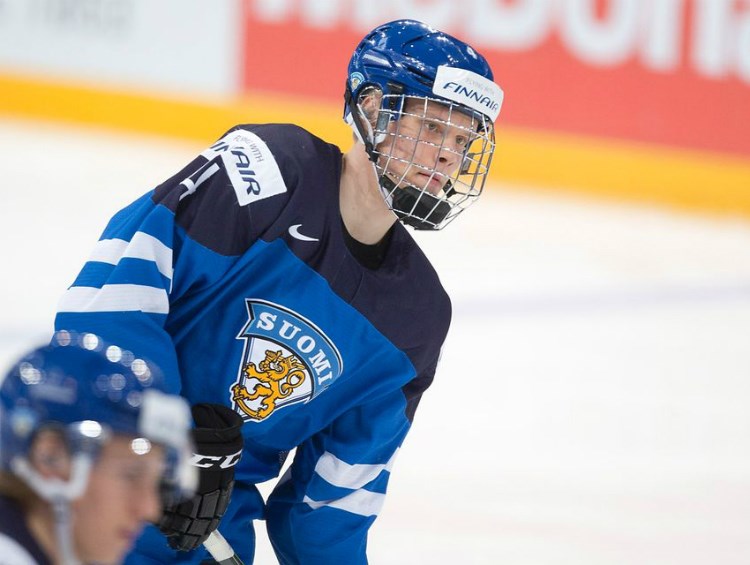 Olli Juolevi skating for Finland