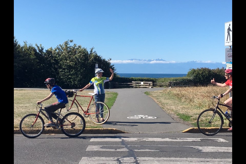 Victoria Mayor Lisa Helps leads riders on the 6.9 kilometre family route out of Ogden Point toward Clover Point along Dallas Road on Sunday and waves the rest of the pack on.