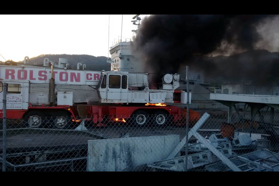 Sooke fire crews encountered a huge column of black smoke and a pickup truck and truck-mounted crane on fire when they arrived at the Lamford Forest Products site on Monday evening.