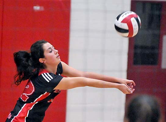 Argyle (green) in action against West Vancouver in senior volleyball action at St. Thomas Aquinas.