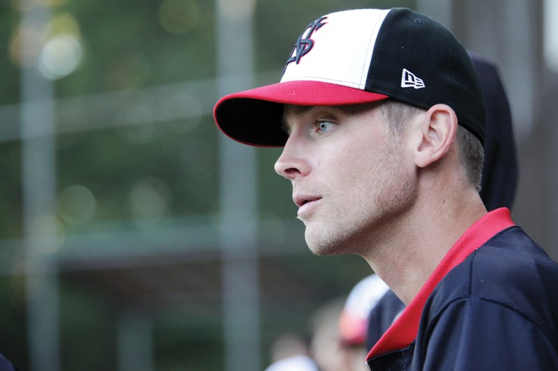 North Shore Twins head coach Brooks McNiven follows the action during a recent B.C. Premier Baseball League game. The former professional pitcher has big shoes to fill replacing Canadian Baseball Hall of Famer John Haar, who won four BCPBL titles in the last nine years. photo by Kevin Hill, North Shore News