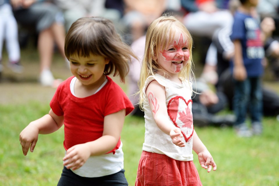 Vera O'Shea, left, and Ourigan Fletcher at Canada Day at Queen's Park.