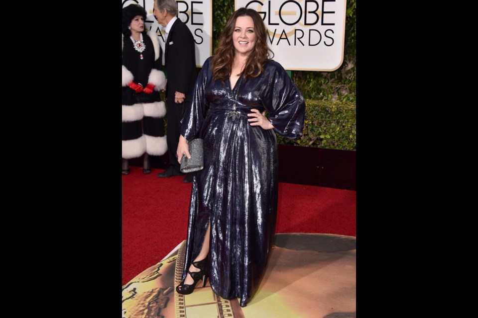Bridesmaids star Melissa McCarthy has launched her own clothing line and designed her dress for this year's Golden Globes.