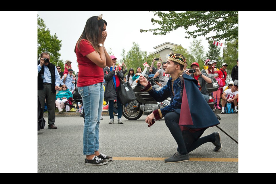 'Prince' Cory Correia pulled his girlfriend and 'princess' Charisse Fernandes from the crowd at the Steveston Salmon Festival before getting down on one knee to ask for her hand in marriage.
