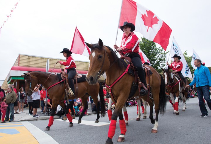The Coastal Cowgirls parade down Cowrie on Canada Day.