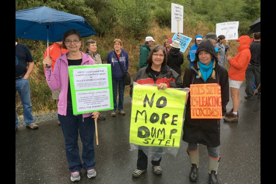 Shawnigan Lake residents gather prior to a press conference this morning in a peaceful protest to protect their watershed.