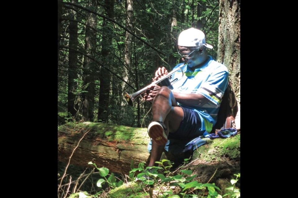 Randeesh Goff has been playing the trumpet in the BC Bike Race for the last three years in a row. This year he will be above Big Firs picnic area.