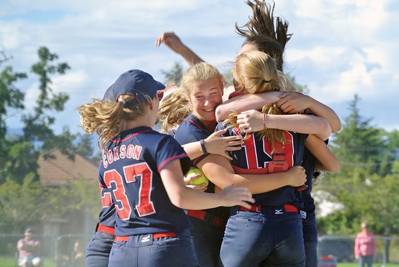 Members of the North Shore Stars Girls 2000 Rep B squad celebrate their gold medal win at the Softball B.C. U16B provincial championships Sunday in Richmond. The Stars topped the South Delta Invaders 5-3 in a tense championship final. photo supplied