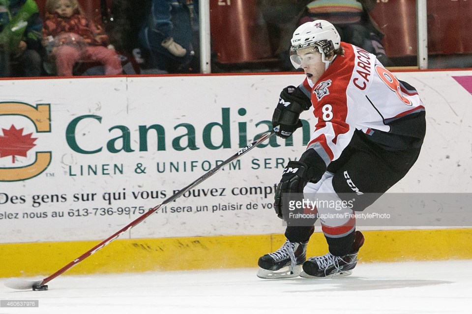 Michael Carcone skates with the puck for the Drummondville Voltigeurs