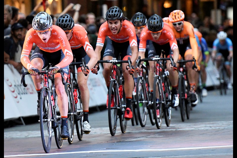 Team Rally members storm the finish line during Wednesday’s Gastown Grand Prix.