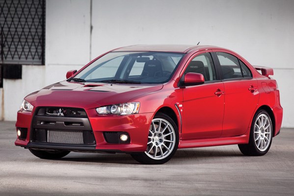 The Mitsubishi Lancer Evolution is no ordinary family sedan - under that rippling hood is a 291 h.p. turbocharged engine. What the Evo lacks in commuter comforts it makes up for with a dynamite drive.