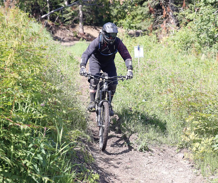 A mountain biker makes their way down the trail Beaver Berms, at Tabor Mountain on Saturday for the opening day of the bike park. Citizen Photo by James Doyle July 16, 2016