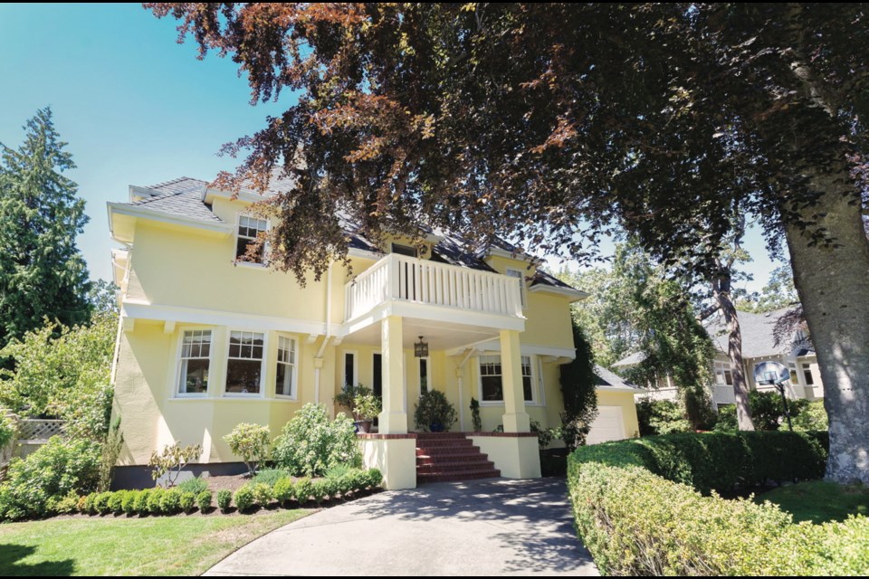 The Uplands home has a welcoming entrance. The driveway is the site of many tennis matches between the girls and their dad, using a moveable tennis net. The house was likely built to feature the magnificent beech tree, a showpiece in the front garden.