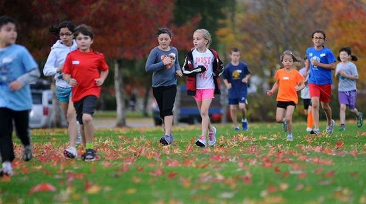 Elementary school runners taking part in the Halloween Howl Cross Country Meet.