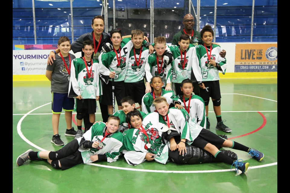 The Burnaby Lakers peewee C squad soak up each others company after wrapping up the provincials last week, where they finished second.