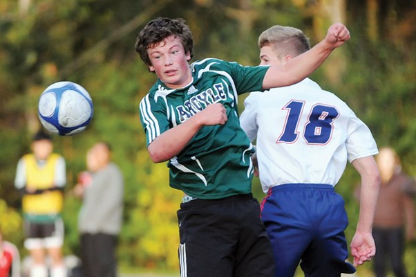 Argyle player keeps his eyes on the ball.