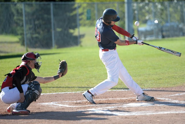 Ladner Red Sox hitter Isaac Embree makes contact with the ball during a game against the Prince George Knights during the B.C. Baseball 18U double-A provincial championship Thursday at Rotary Field. Citizen photo by Brent Braaten Aug 4 2016