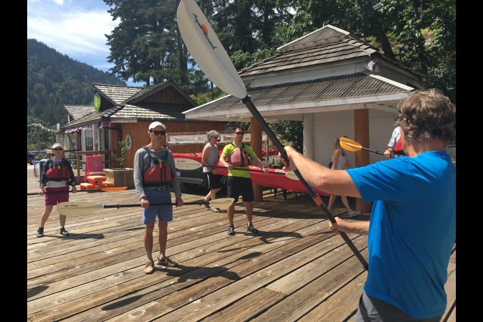 Bowen Island Sea Kayaking owner Brent O’Malley starts the tour with some easy on-land instructions.