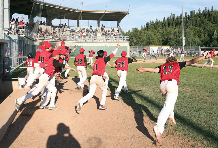 The Prince George Lomak Knights jump for joy as Scott Walters bring home the winning run in a walkoff 8-7 victory over the Ladner Red Sox in the BC Baseball double-A midget championship game Sunday evening st Citizen Field.