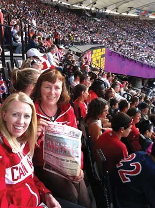 Christine Coletta and Alison Scholefield watch friend Liz Gleadle compete in javelin at the London Games.