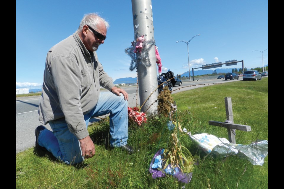 Ron Mahy at the memorial site on Sea Island near where his daughter, Christy, was struck and later died of her injuries on July 30, 2014. The police have yet to lay charges in the matter. File photo