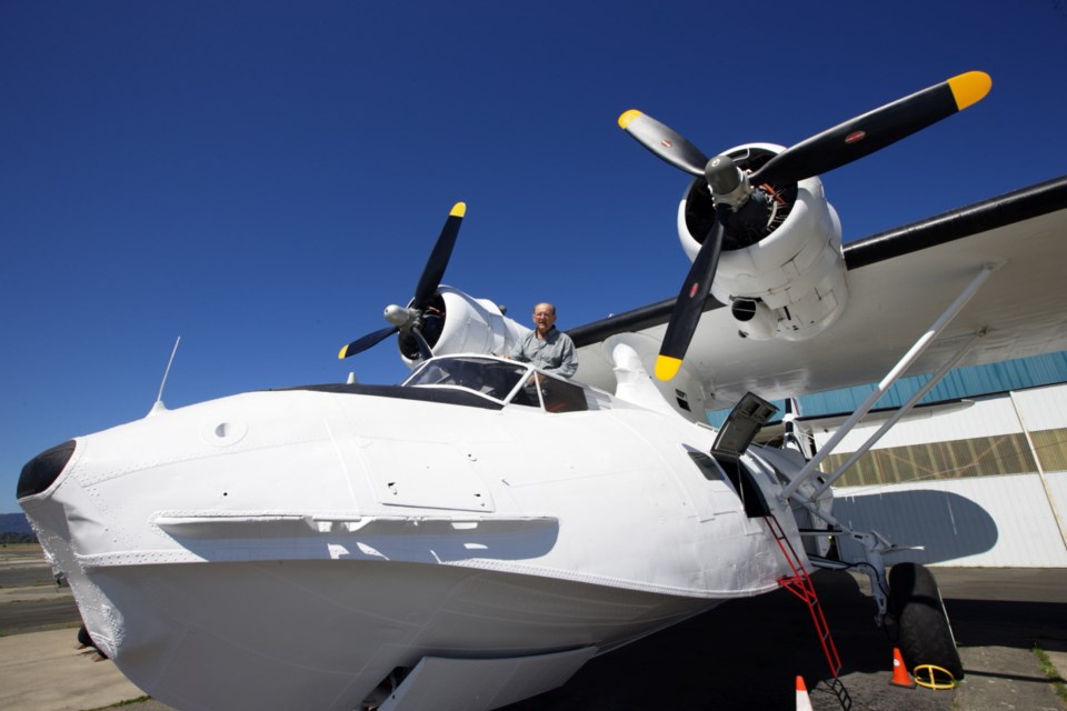 Bob Dyck with his PBY Catalina at Victoria International Airport.