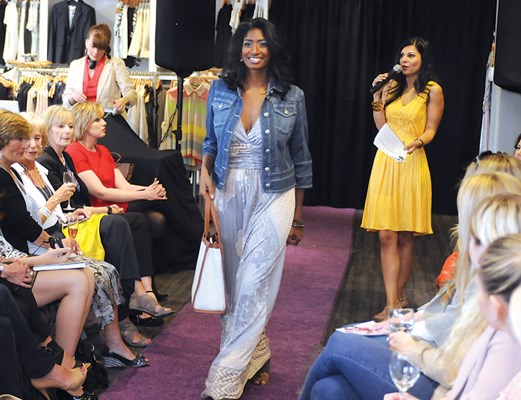 Wear Else president Zahra Mamdani chats trends while Farzana models a Luisa Cerano jacket, Hale Bob dress, Raoul bag and Donald Pitner shoe.