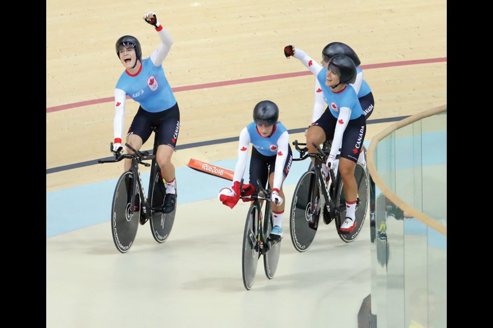 Georgia Simmerling (left) celebrates with her teammates after claiming bronze in the women’s track cycling team pursuit event at the Rio Olympics Saturday. photo Mark Blinch/Canadian Olympic Committee