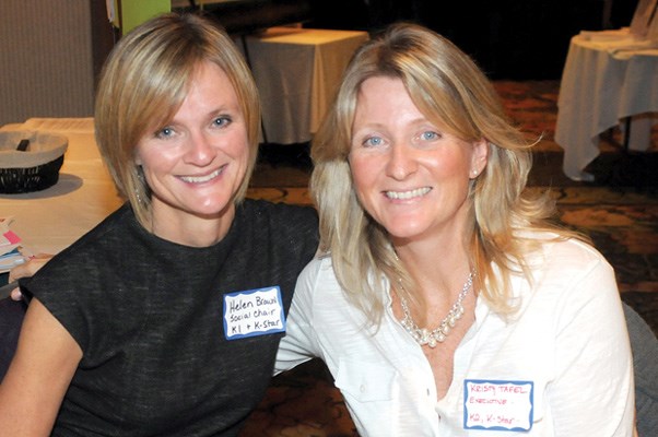 Socials chairwoman Helen Brown and board member Kristy Tafel flash their smiles.