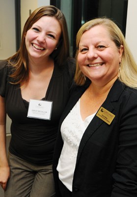 Ashley McCallum and Alison Bailey greet guests.